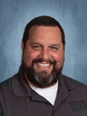 Yearbook picture of Scott Harrison, math teacher in rural Michigan.